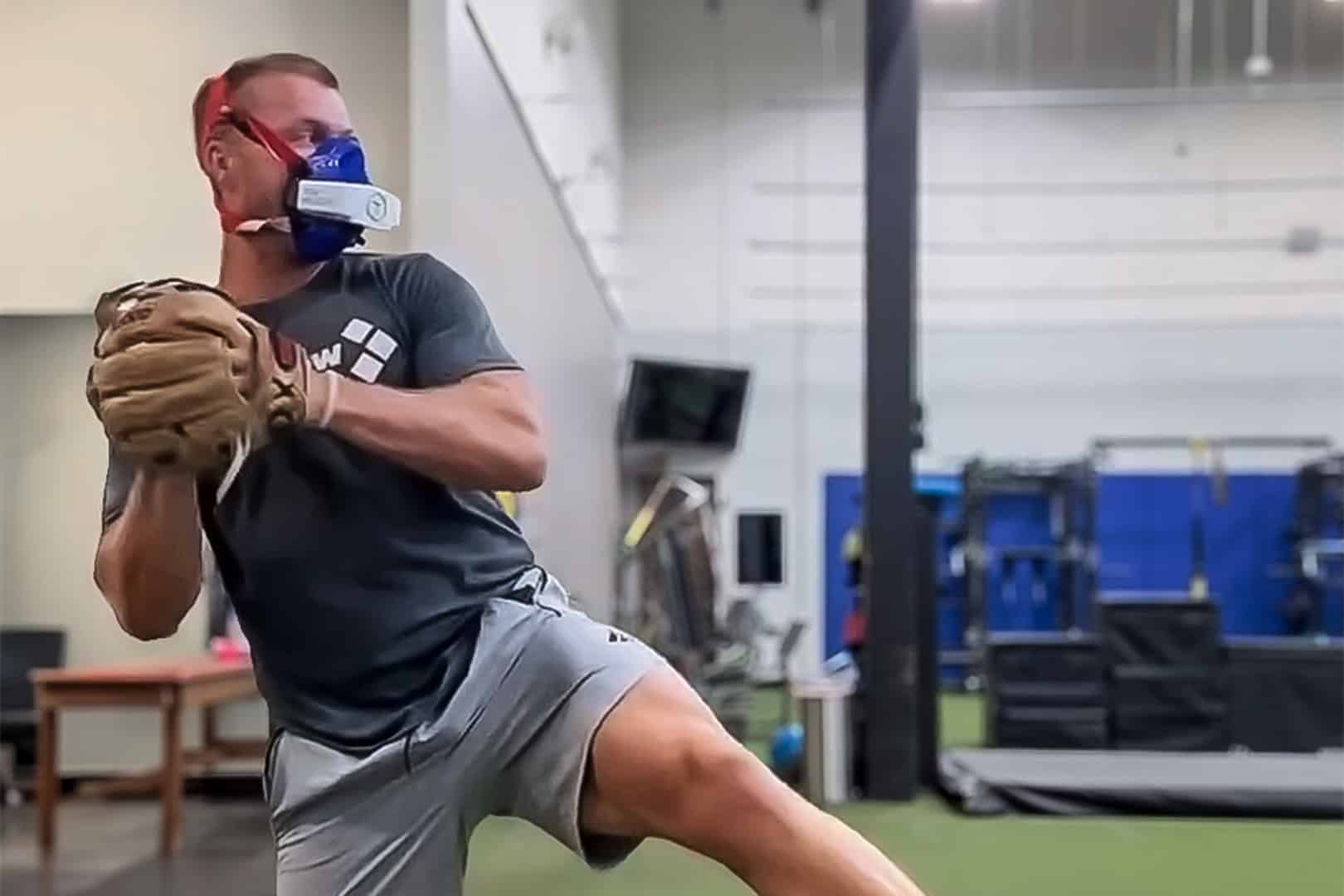 Baseball player Ben Baggett during a VO2 test with the VO2 Master Analyzer during pitching exercises