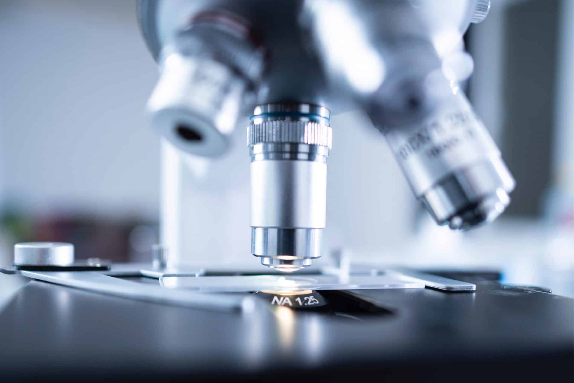 Microscope in a research lab setting