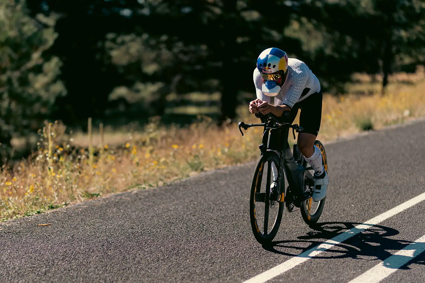 Cyclist Kristian Blummenfelt performing a high-effort field test on the road to assess metabolic efficiency and VO2-based performance metrics.