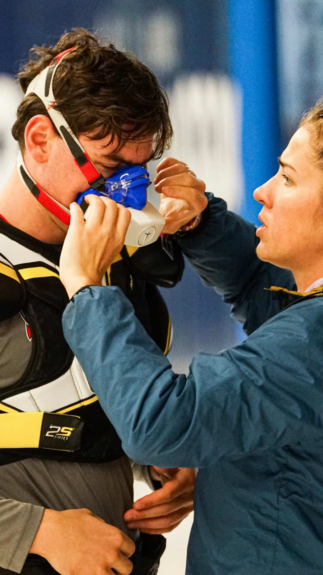 An athlete and coach performing a fitting using the VO2 Master Analyzer