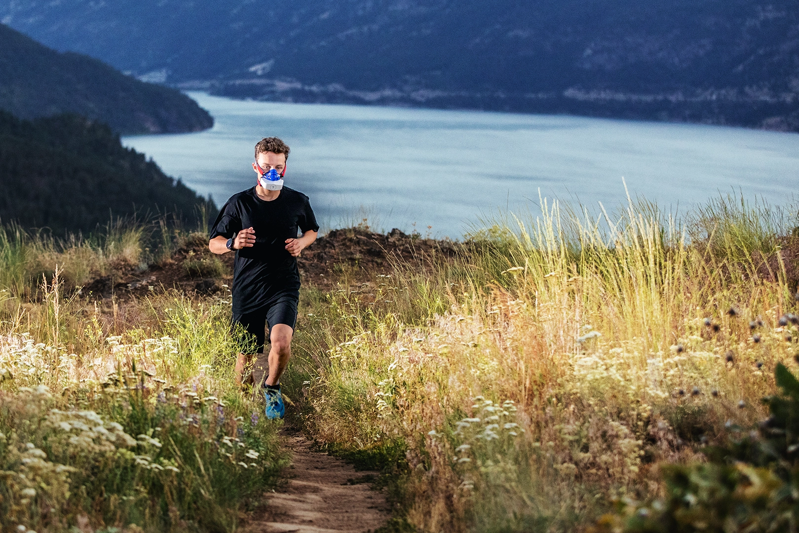 Runner performing VO2 testing in the field with a portable metabolic analyzer for aerobic capacity assessment.