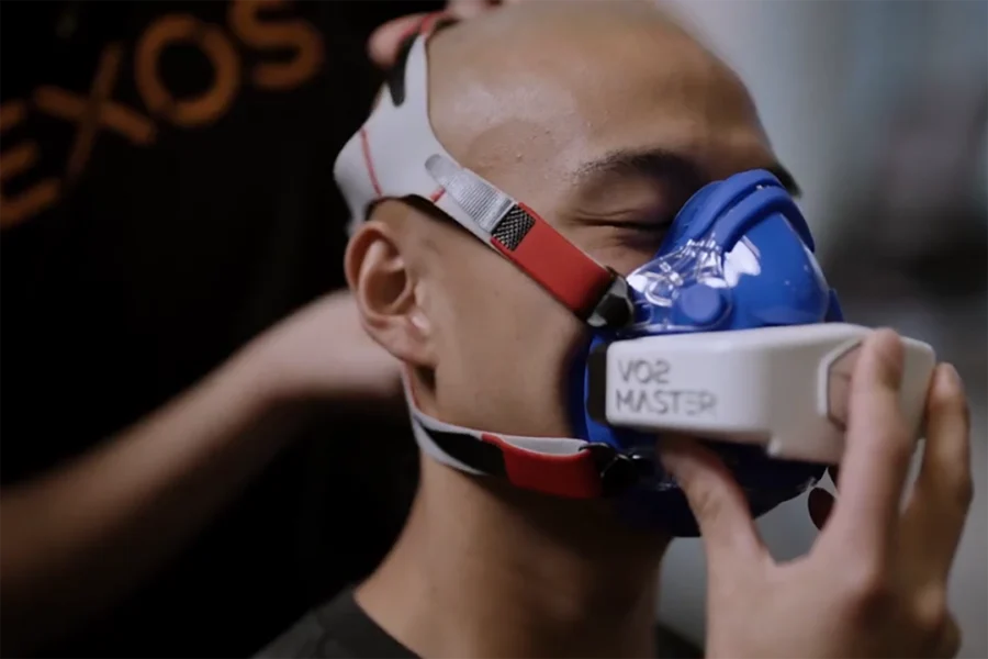 Client being fitted with a VO2 Master for portable metabolic testing during VO2 max testing at the Exos Human Performance Lab.