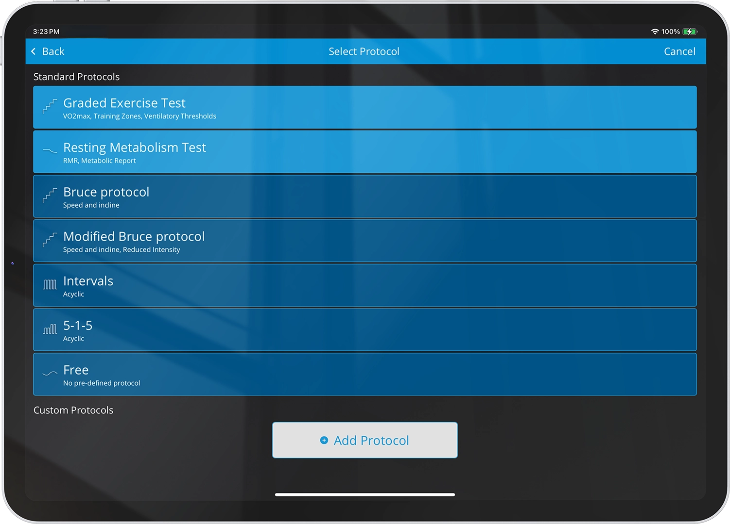 VO2 Master app displayed on an iPad showing protocol options for graded exercise, resting metabolism and custom metabolic testing.
