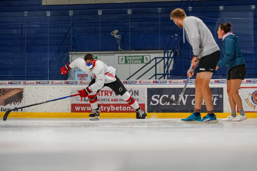 Simon Nemec wearing a VO2 Master Analyzer while skating on the ice during sport-specific performance testing.